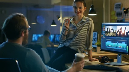 Poster - Beautiful Female and Handsome Male Video Editors Discuss Footage They're Working On. They Enjoy Working Together in a Creative Studio. Shot on RED EPIC-W 8K Helium Cinema Camera.