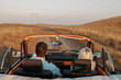 © FrameWorks/Stocksy - Couple on weekend road trip