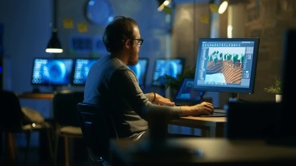 Poster - Male Game Developer Works with Graphic Tablet, He Creates New Game Level on His Personal Computer. He Works for in a Creative Office Environment. Shot on RED EPIC-W 8K Helium Cinema Camera.