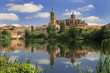 Salamanca Old and New Cathedrals reflected on Tormes River