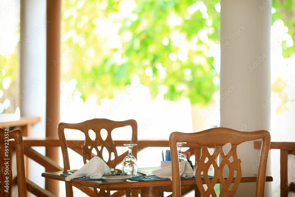 Table set in modern cafe at resort