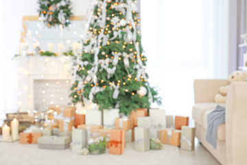 Wall Mural - Blurred view of beautiful fir tree in decorated for Christmas room