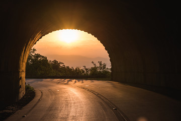 sunrise through tunnel on the blue ridge parkway, north carolina