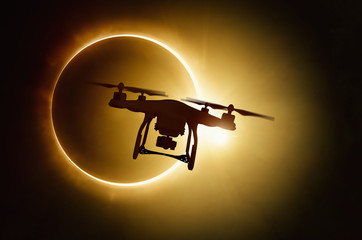 Wall Mural - drone silhouette on total solar eclipse background