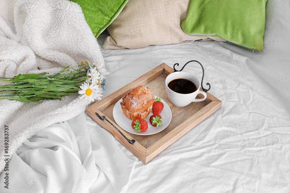 Delicious breakfast on bed