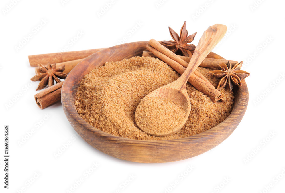 Composition with sweet cinnamon sugar on white background