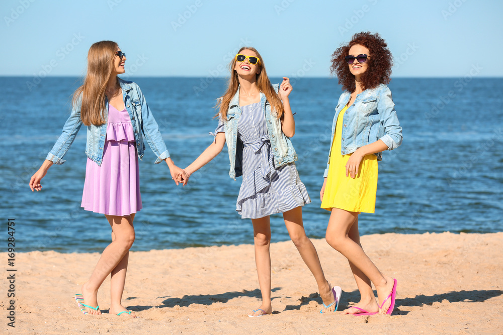 Beautiful young women at sea resort