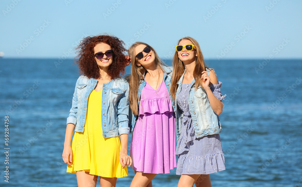 Beautiful young women at sea resort