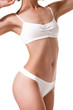 © nazarovsergey - Beautiful healthy fit slim female body on white background