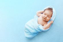 Newborn Baby Boy Sleep On Blue Blanket