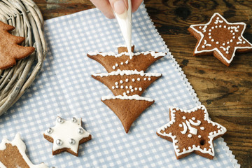 Poster - Decorating gingerbread cookies for christmas.