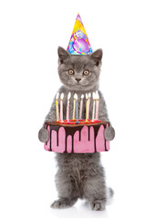 Poster - Funny kitten in party hat holding birthday cake with many burning candles. isolated on white background
