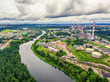 Vilnius, Lithuania: aerial UAV top view of Neris river and industrial area in Vilkpede in the summer