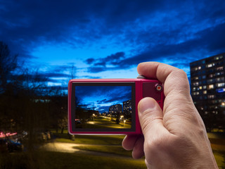 Evening in neighborhood in camera viewfinder