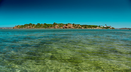 Wall Mural - Inspirational low angle shot of crystalline waters in Praia da Rocha beach, the Algarve, Portugal