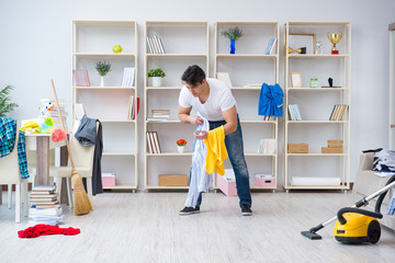 Man doing cleaning at home