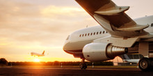 White Commercial Airplane Standing On The Airport Runway At Sunset. Passenger Airplane Is Taking Off. Airplane Concept 3D Illustration.