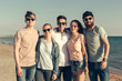 © fotofabrika - Group of young people enjoy summer party at the beach