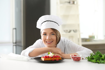 Sticker - Female chef with tasty dessert in kitchen