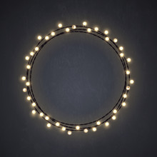 Warm Colored Christmas Incandescent Light String Wreath On The Dark Grey Background. Vector Outdoor Patio Lights.