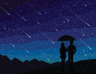 starfall. silhouette of couple under umbrella, watching falling stars. the starry night sky. meteor 