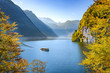 Lake Koenigssee with tourist boats in fall, Bavaria, Germany