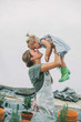 © Studio Firma/Stocksy - Beautiful woman and her little girl having fun in the garden