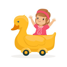 Cute Little Girl Riding On Yellow Duck, Kid Have A Fun In Amusement Park Cartoon Vector Illustration