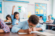 © LIGHTFIELD STUDIOS - girl raising hand in class