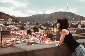 Fototapete - Woman with the view on Tbilisi, Georgia