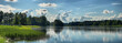 Panorama of a summer landscape with a lake