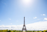 Fototapeta Na drzwi - Wide angle view on the Eiffel tower on the blue sky background in Paris
