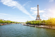 Landscape view on the Eiffel tower and Seine river during the sunny day in Paris