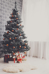 Wall Mural - Christmas decorated tree in modern interior, holiday concept