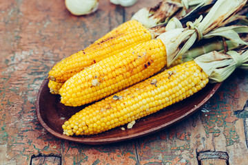 Baked sweet corn cobs