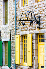 Canvas Print - Colorful yellow european stone houses buildings in old city