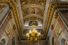 Interior Of The St Isaac Cathedral In St Petersburg, Russia. Decorated Ceiling And Chandelier