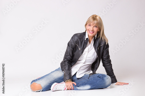 happy smiling mature woman 40s laying on floor casual clothes Poster