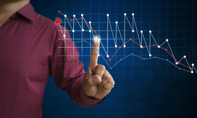 Businessman offering chart business diagram statistic , Using modern technologies for business ./ Show through hand for support stock financial graph