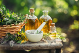 Spa composition with Fresh herbs and different types of oils.