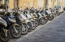 Row Of Parked Mopeds