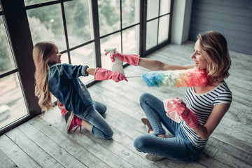 Wall Mural - Mom with daughter doing cleaning