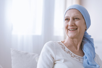 Wall Mural - Cancer woman smiling with hope