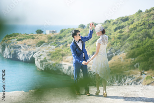 Asian Couple With Pre Wedding Sceen Outdoor The Sea And Mountains Background Thai Lover Stock Photo Adobe Stock