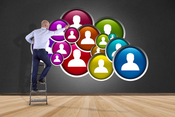 Poster - businessman in front of a wall with a group of contact icon displayed on a technology interface back