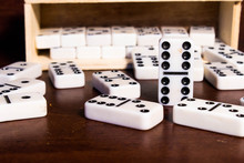 Pieces Of Domino Principle Concept In Black And White Effect