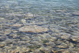 Fototapeta Morze - Stones in water