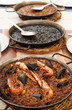 spanish seafood paella, black paella and fideua