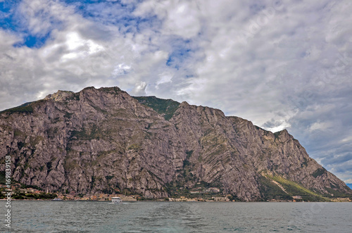 Fotografie, Obraz lake garda overview wiht clouds in the sky photo
