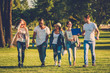 © Nejron Photo - Multi-ethnic group of friends in a park
